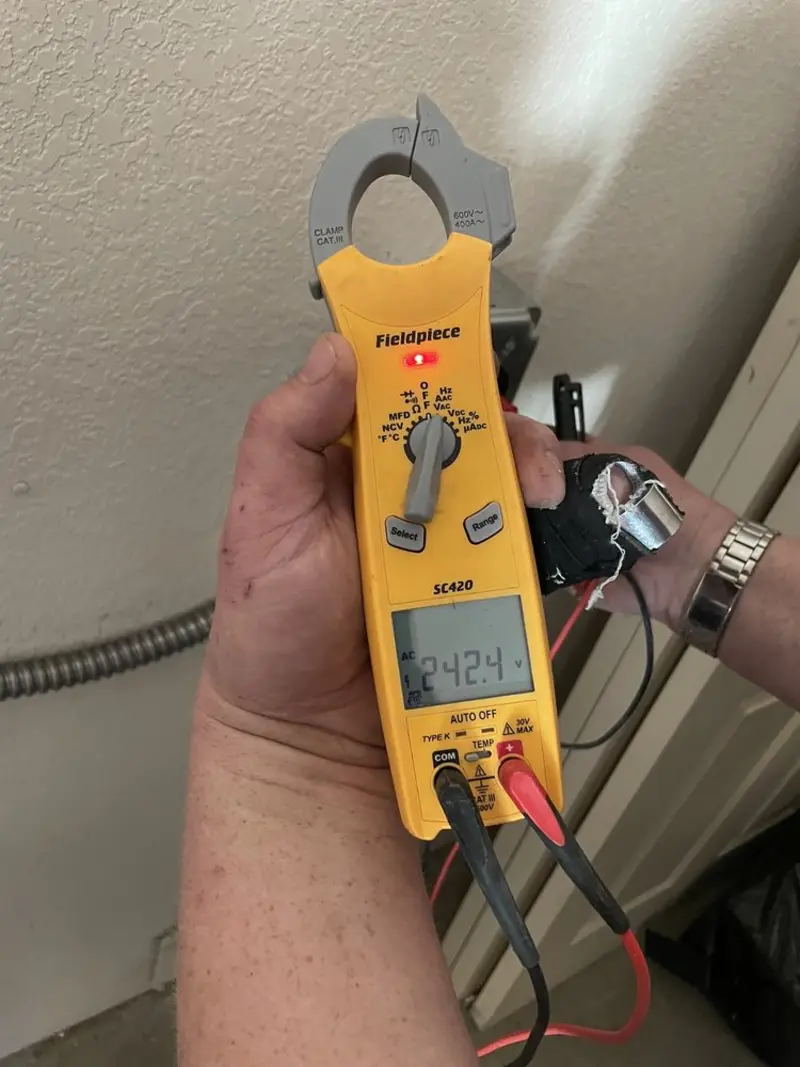 Voltage testing with clamp meter during Circuit Breaker Repair in Rice